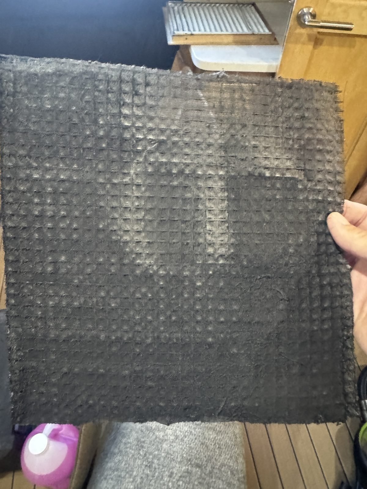 Fouled marine sea strainer basket pulled for cleaning