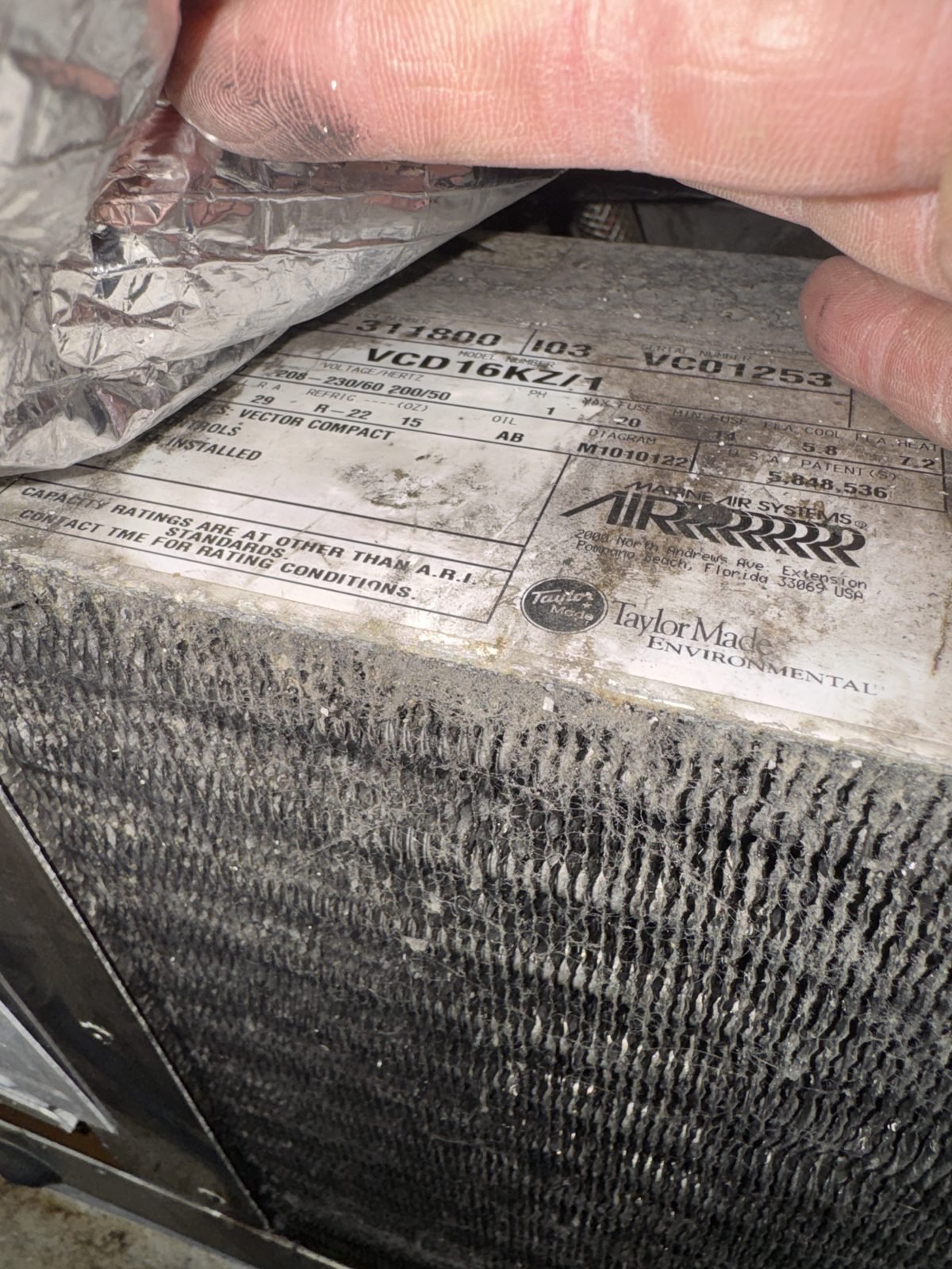 Scaled marine condenser coil from a season of lake water